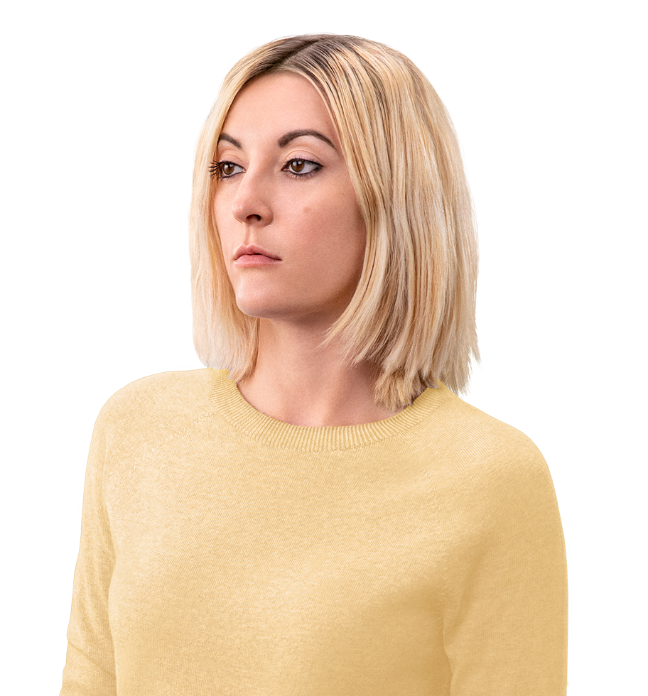 White female in a yellow sweater, not actual Serostim® patient